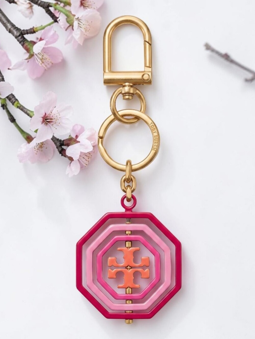 Tory Burch Rotating Geometric Red and Pink Keychain